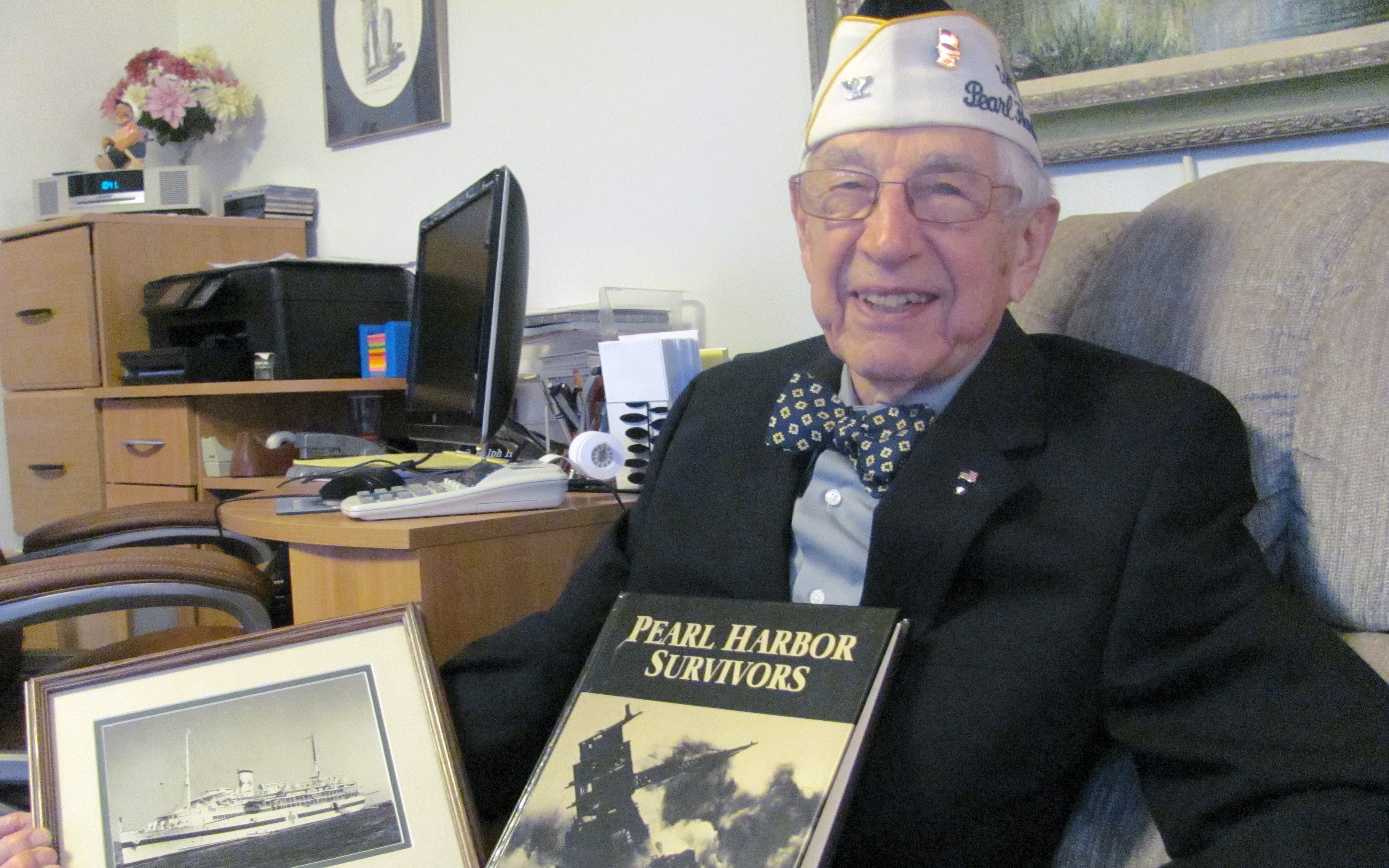 Ralph Laedtke, 90, is among the survivors of the Japanese attack on Pearl Harbor Dec. 7, 1941. He served on the USS Solace (pictured in framed photo), which provided medical services. Laedtke's wife Ferne (Bottemiller) Laedtke grew up in Washougal. The couple recently moved from Illinois to this area.