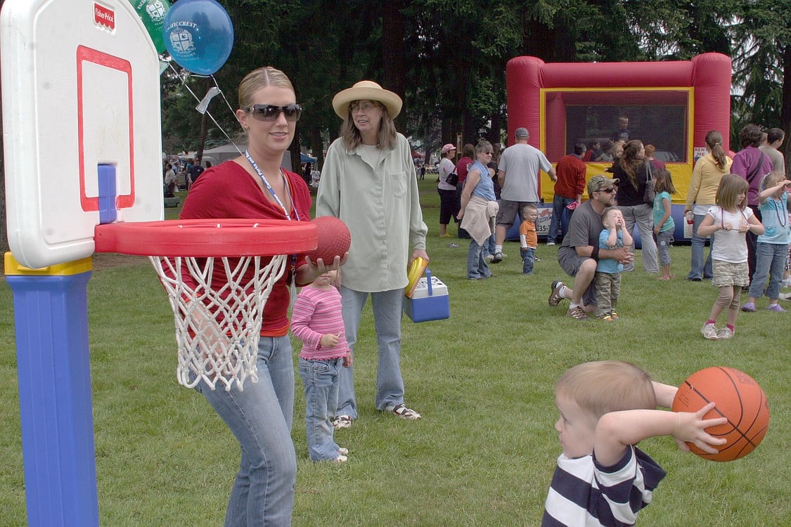 A young Camtown attendee takes aim at the basket in the hopes of winning a prize. This year's festivities will take place from 11 a.m. to 3 p.m. Saturday, June 11 at Crown Park.