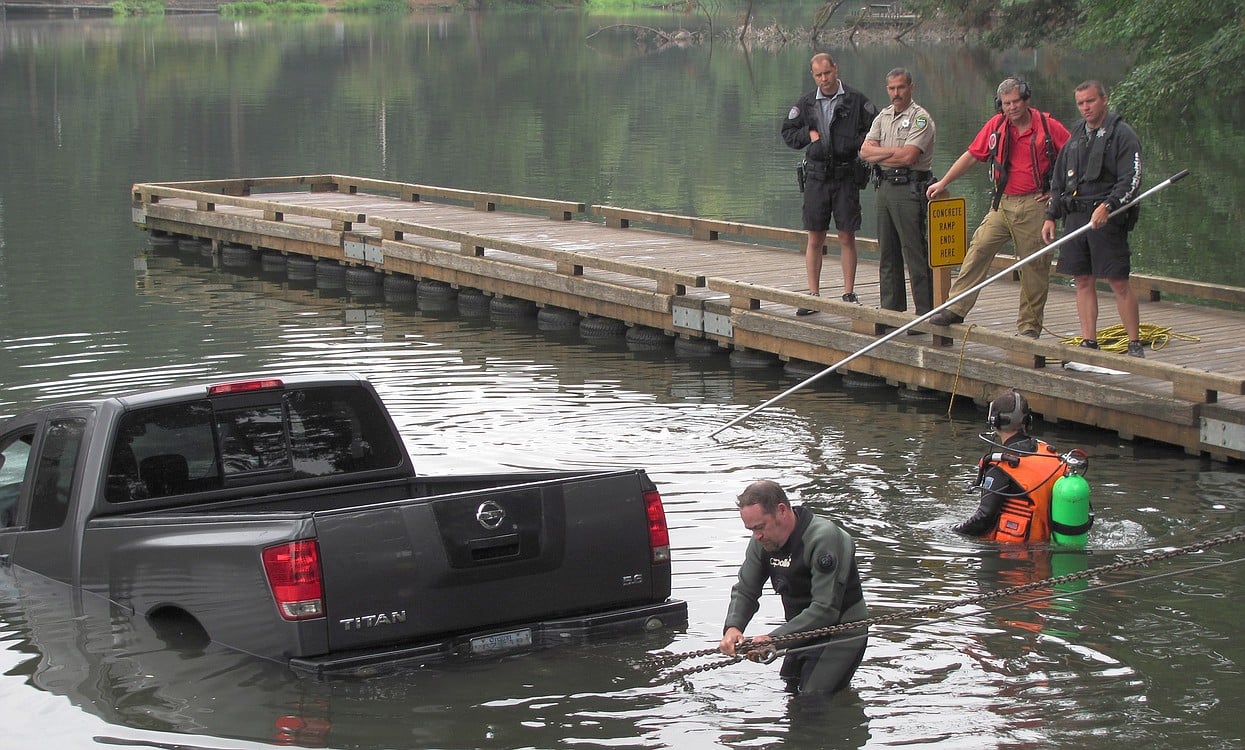 A 2006 Nissan Titan truck was pulled out of Lacamas Lake in Camas Monday at noon by employees with Orchards Towing & Recovery. The truck's emergency brake had been released near the launch ramp at Heritage Park, around 12:15 a.m. Responding agencies included the Camas Police and Fire departments, Clark County Sheriff's Office Marine Patrol Unit, Southwest Washington Organization of Rescue Divers and the Department of Ecology. After the truck was retrieved, material was used to absorb gasoline and oil. According to CPD dispatch records, the registered owner of the truck is Joseph Giles, of Portland.