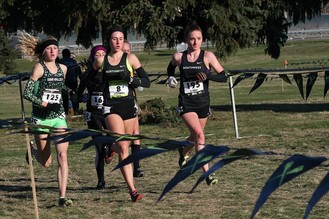 Camas' Alexa Efraimson (8) beat Sarah Baxter (left), of Simi Valley, Calif., and Elise Cranny (right), of Niwot, Colo., for the 2013 Nike Cross National Championship Dec. 7, at Portland Meadows.