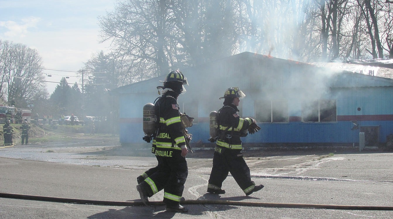 Firefighters make final preparations for the controlled burn of the former Riverside Bowl building in Camas along Northeast Third Avenue. The facility was originally built in 1947, and when it was destroyed on Saturday it was one of the largest practice burns in Camas history with smoke visible from several miles away. Personnel from the Camas and Washougal fire departments and  East County Fire and Rescue participated in the training exercise. The fire was still smoldering Monday morning, 48 hours after it began.