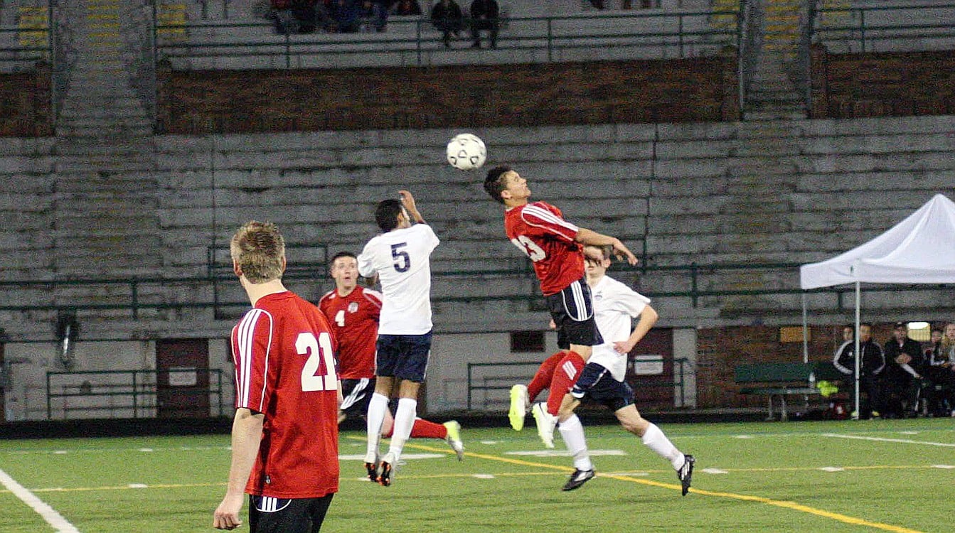 Camas forward Cameron Eyman heads the soccer ball beyond a Skyview defender during overtime April 1, at Kiggins Bowl. The Papermakers and the Storm fought to a 0-0 draw.