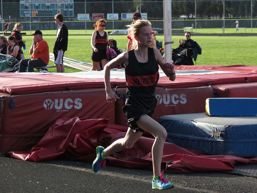 Courtney Owens kicks to the finish line first in the 3,200-meter run Thursday, at Longview Memorial Stadium. The freshman also won the 1,600 for Washougal.