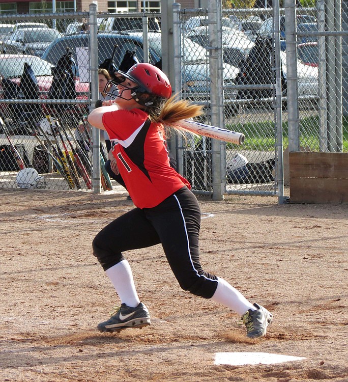 Lena Richards rips a triple into the left field corner April 29, at Camas High School.