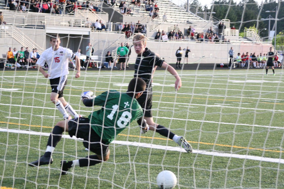 Camas senior Adam Allison outwits the goalkeeper with a header into the back of the net Wednesday, at Doc Harris Stadium. The Papermakers defeated Bishop Blanchet 1-0 in the first round of the state tournament. Camas (16-2) faces Mountain View in the quarterfinals Saturday, at Doc Harris. Kickoff is at 7 p.m.