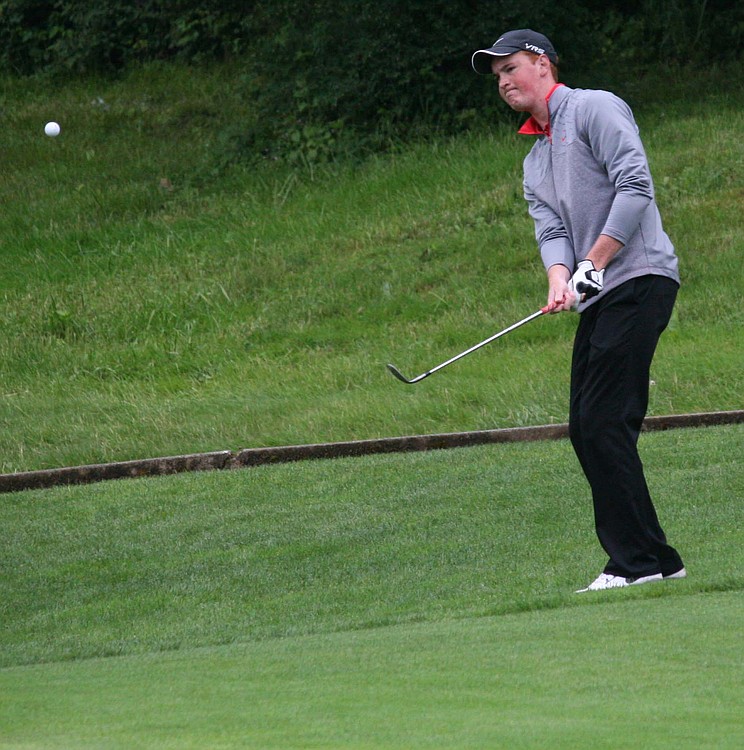 Brian Humphreys chips on to the ninth green during the final round of the 4A state boys golf tournament at Camas Meadows. The CHS sophomore shot 3-under par Thursday to place second.