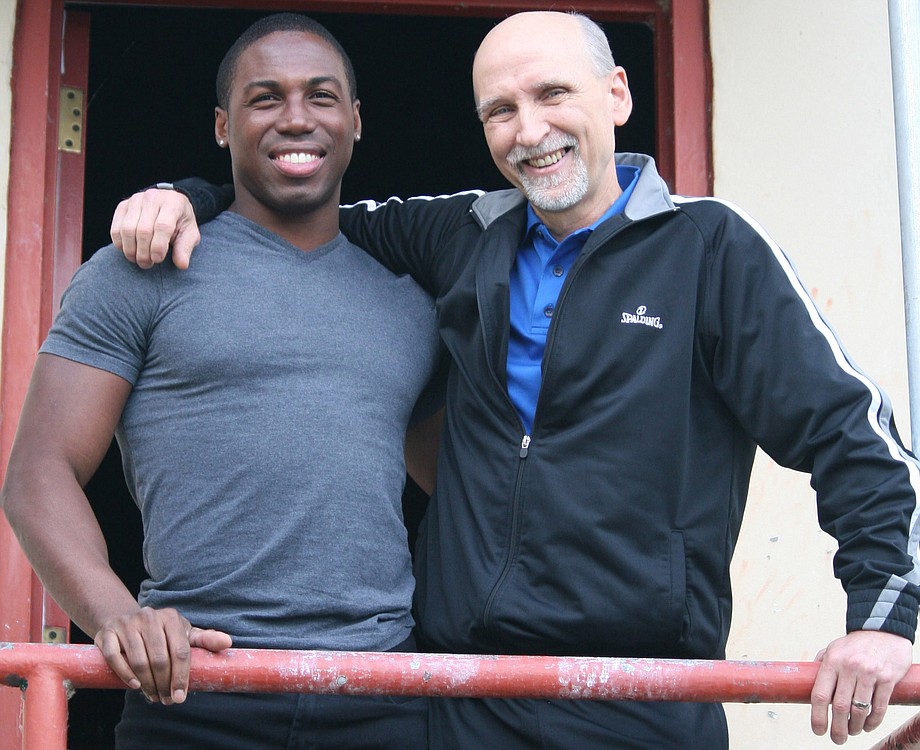 Alex Sturrup (left) visits his mentor Randy Fox (right) at VEGA during a vacation from dancing for Royal Caribbean. Fox will be inducted into the USA Gymnastics Region 8 Hall of Fame Saturday.