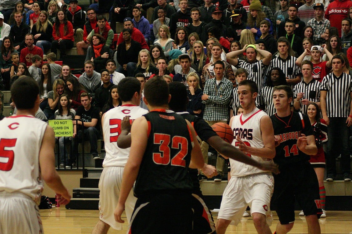 Jordan Lenard receives a pass from Nick Lopes and takes it to the hoop for the Papermakers. The Camas boys basketball team defeated Washougal 74-54 Friday, at Camas High School.