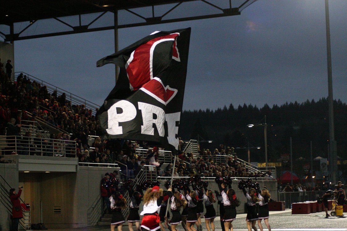 Celebrating another touchdown by the Camas High School football team Saturday, at Doc Harris Stadium. The Papermakers beat Cascade 63-28 in the first round of the state tournament.