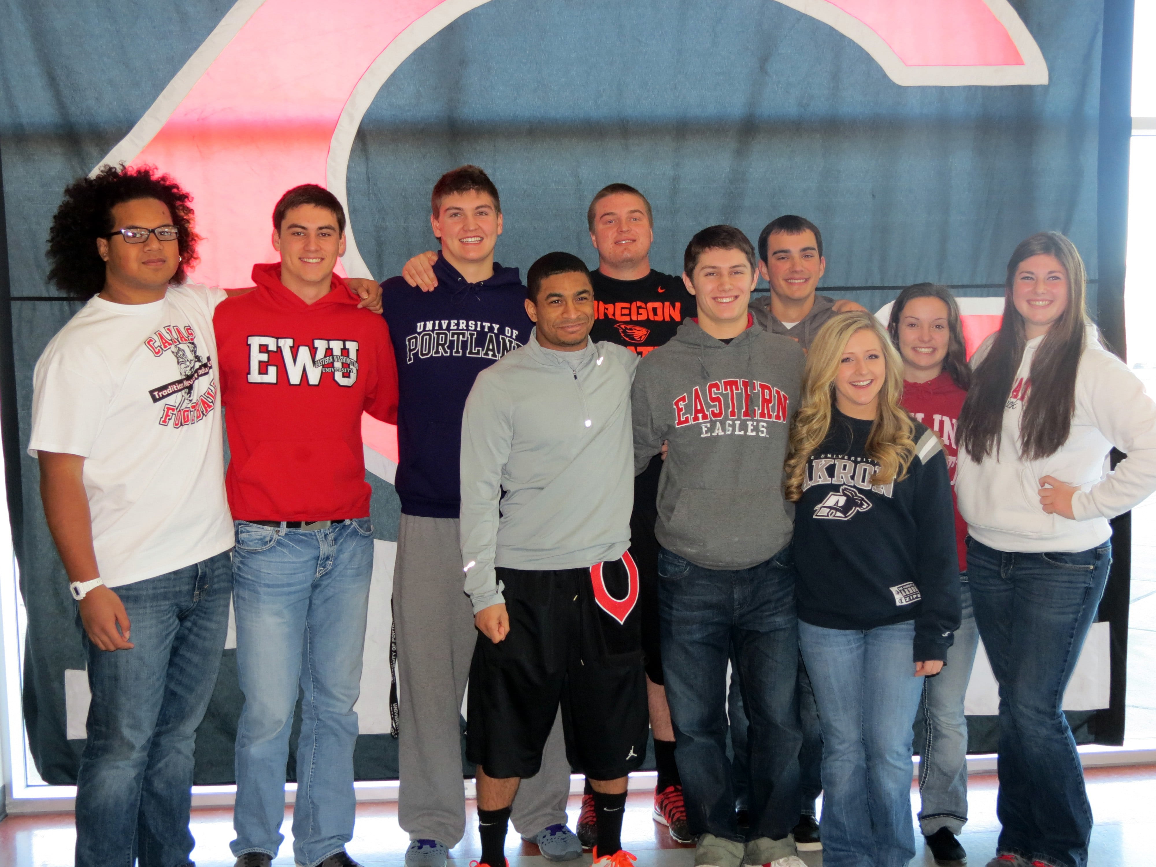 Ten Camas High School seniors participated in National College Signing Day. Pictured in the back row (left to right): Jason Vailea, Reilly Hennessey, Dylan White, Drew Clarkson, Blake Christopher, Teylen Sheesely and Harli Hubbard; front row (left to right): Jorden Payne, Zach Eagle and Lena Richards.