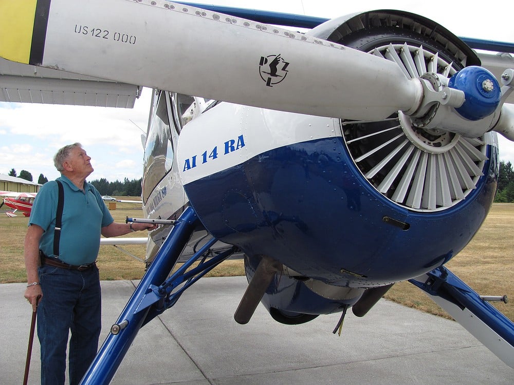 Ken Marple, of Camas, looks at one of the airplanes on display Sunday, during an aviation event at Grove Field Airport, in Fern Prairie. In addition to cheeseburger lunches, T-shirts and airplane rides to benefit the Camas-Washougal Aviation Association scholarship fund, the event included information about local flight training opportunities.