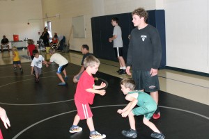 Gage Dillon (left) and Blake Adair (right) get ready to grapple Wednesday, during the Clark County Coach-A-Roo wrestling camp at Skyridge Middle School in Camas.