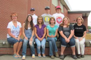 Eleven students and three chaperones from Skyridge and Liberty middle schools recently returned from a trip to Poland. Pictured here are (back row, left to right), Zach Pfeifer, Elijah Wolfe and Liam Bradley. In the front row are (left to right) Liberty principal Marilyn Boerke, Danielle Przedwojewski, Rachel Rakoski, Lacy Harness, Emily Brusseau and Juli Bradley. Not pictured are Marcus Roberts, Bennett Lehner, Ella Dewars and Calla Mavros, and chaperone Carolee Dewars.