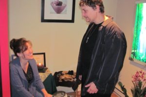 Psychic Seth Michael McKay visits with Washougal resident Alison Meyer at The Wild Hair salon in Camas last week.  Meyer came in wanting to know more about a close friend who had recently passed away.