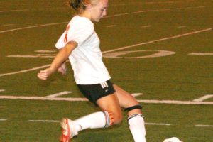 Ellie Boon aims for the net Thursday, at Fishback Stadium. The Washougal High School sophomore scored three goals against Hockinson and four goals against R.A. Long.