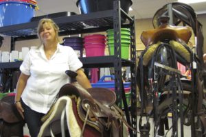 Bits n Spurs, a new business in Fern Prairie, sells new and used clothing and tack, feed and supplies. A grand opening, hosted by owner Karin Emmerich (pictured) and manager Nancy Allen (not pictured) will be held Friday through Sunday.