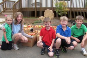 The Riverside Adventist Christian School is celebrating 20 years of the Apple Festival this Sunday. The popular community event includes a sweets booth, apple pies, dumplings, games, activities and of course, apples. Pictured, left to right, are Dixie Knoll, Emily Turcic, Ben Stephenson, Anthony Ferzacca and Austin Lauser.