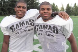 Camas High School senior Kenny Marshall (left) and his younger brother Zack (right) made their parents Verna and Kenneth Sr. proud by both scoring touchdowns Friday, at District Stadium in Battle Ground.