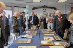 Local officials and business representatives filled the Port of Camas-Washougal meeting room Friday for a ceremony commemorating the port's 75th anniversary. The memorabilia on display included newspaper articles, photos of Grove Field Airport founder Ward Grove and a plaque that dedicated the marina in memory of Thomas Blair in 1972. A slide show featured images of the port's Industrial Park and Airport, as well as summer concerts in Marina Park, Capt. William Clark Park, Parker's Landing Historical Park and the flood of February 1996.