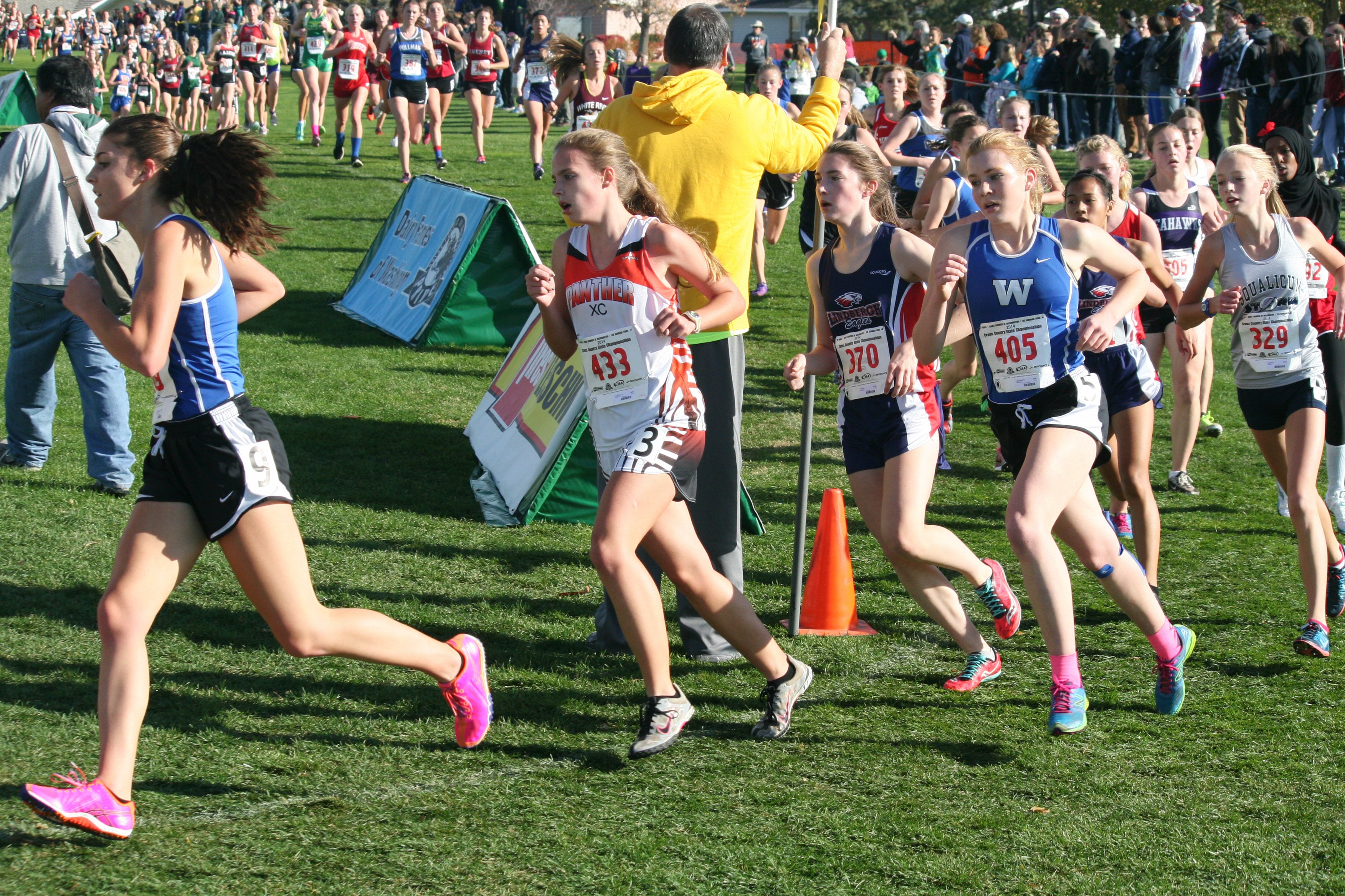 The state's best female runners in the 2A division make the big turn at the state championship cross country race Saturday, at the Sun Willows Golf Course, in Pasco. Can you spot the one Washougal Panther along this snake-like trail?