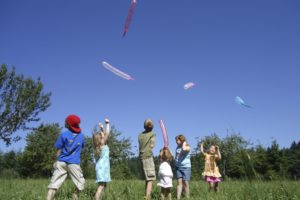 Campers launch balloon rockets at one of the Camp Windy Hill daycamps in Washougal. Children have their choice of three different creative camps.