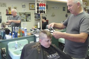 Owen Jacobs-Brown, of Camas, receives a "mohawk" haircut from Dan Smith at Carla's Barber Shop. With 38 years of barbering experience, Smith offers flat tops, tapers, fades, head shaves and women's haircuts. "Carla's is kind of an old style barber shop -- with a lot of fun and sports talk," he said. "There is a good feel here. It's laid back and one of the best flat top shops found anywhere." Carla's Barber Shop, 210 N.E. Fourth Ave., in downtown Camas, is owned by Carla Rodgers. For more information, call 834-3238.