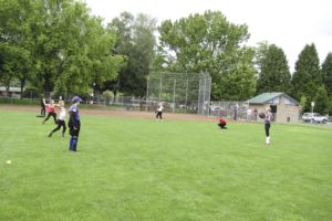 East County Little League softball players warm up for practice at Goot Park, in Camas. Softball parents want their children to have access to the newer fields at Schmid Memorial Park.