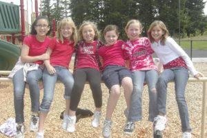 Grass Valley students (left to right) Ashley Gerst, Cassidy Kendall, Sierra Goodwin, Hanna Upkes, Janessa Wilson and Jenna Efraimson wore red to school every Tuesday to support Wilson's efforts to help Kingston Springs Elementary School.