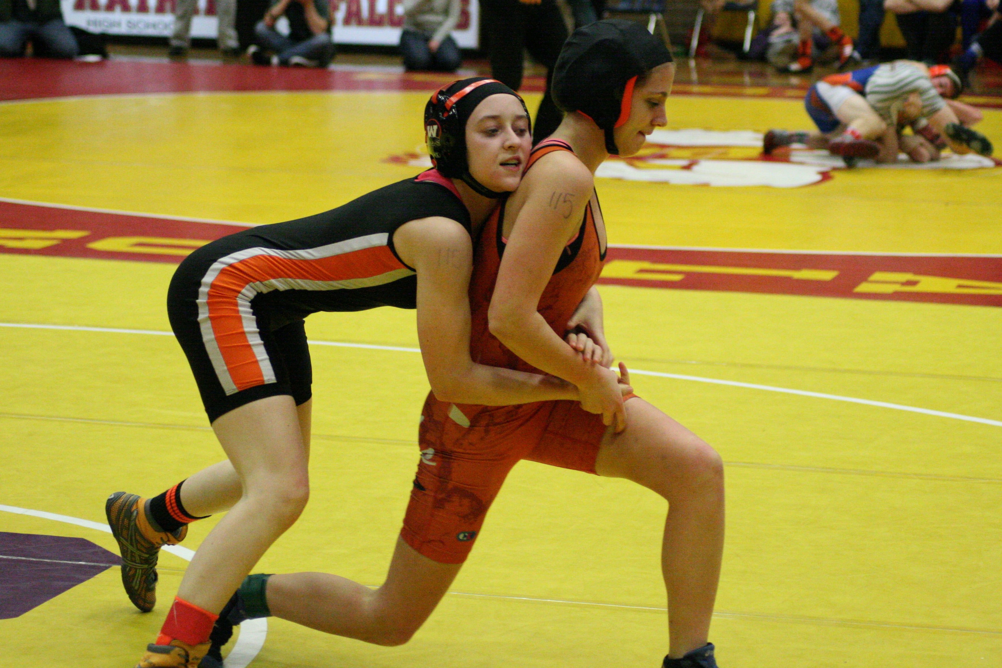 Washougal Panther Jessica Eakins loses her grip on this Kalama Panther in the 115-pound Clark County championship match. Eakins lost and settled for second place.