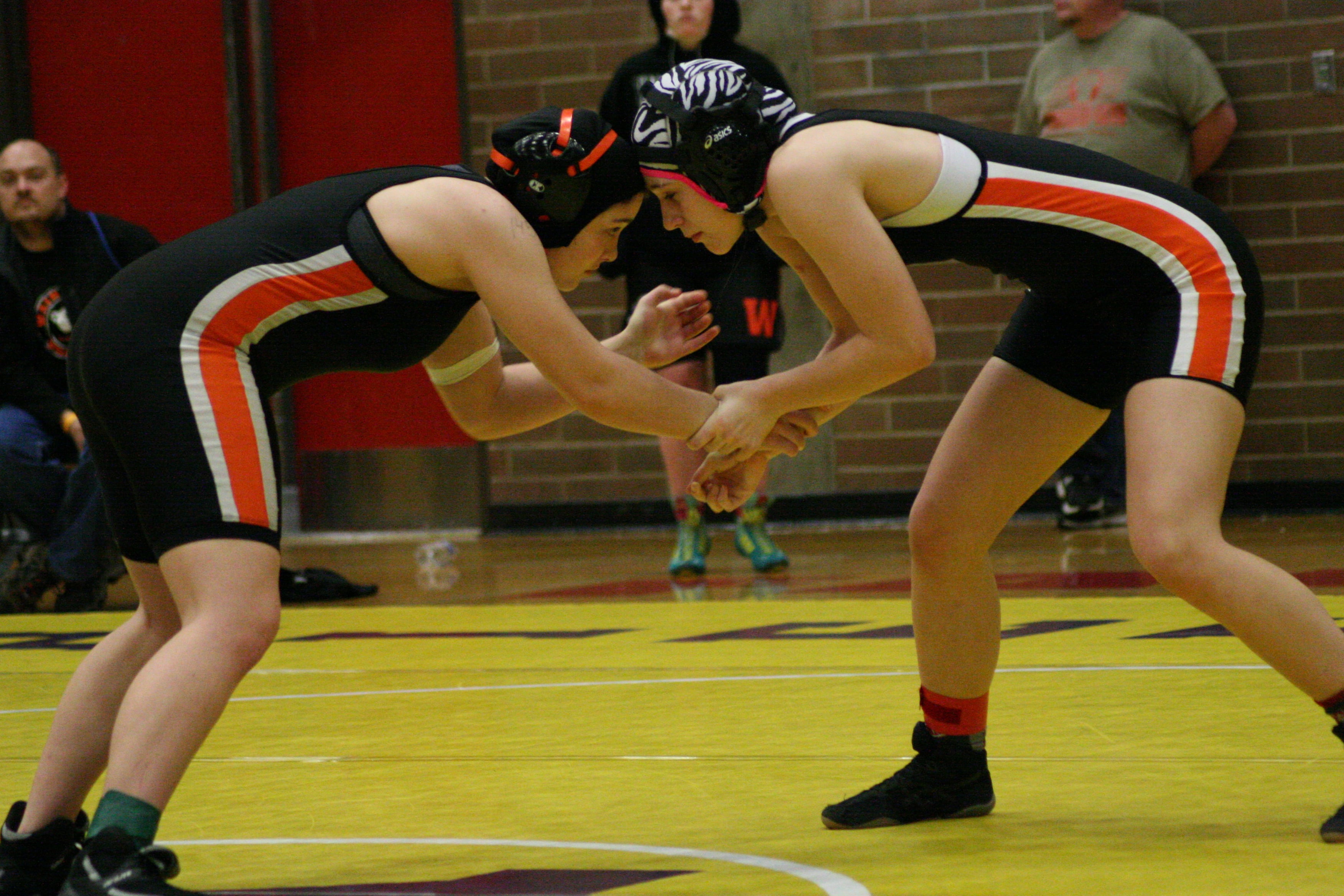 Washougal Panthers Christina Murray (left) and Hannah Eakins (right) wrestle for the 145-pound Clark County girls championship.