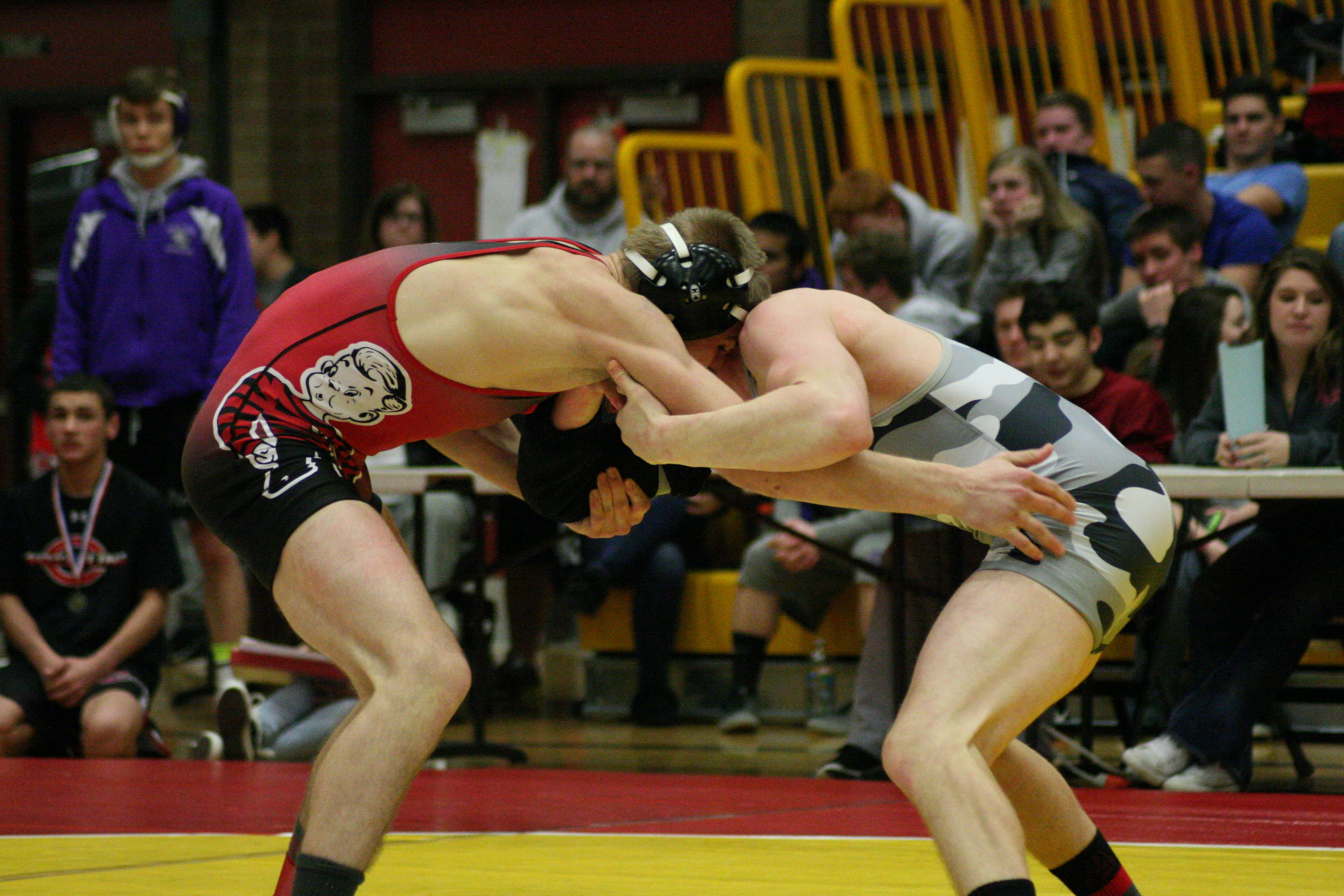 Bryant Elliott and Tommy Strassenberg throw each other around in search for those first points of this championship match.