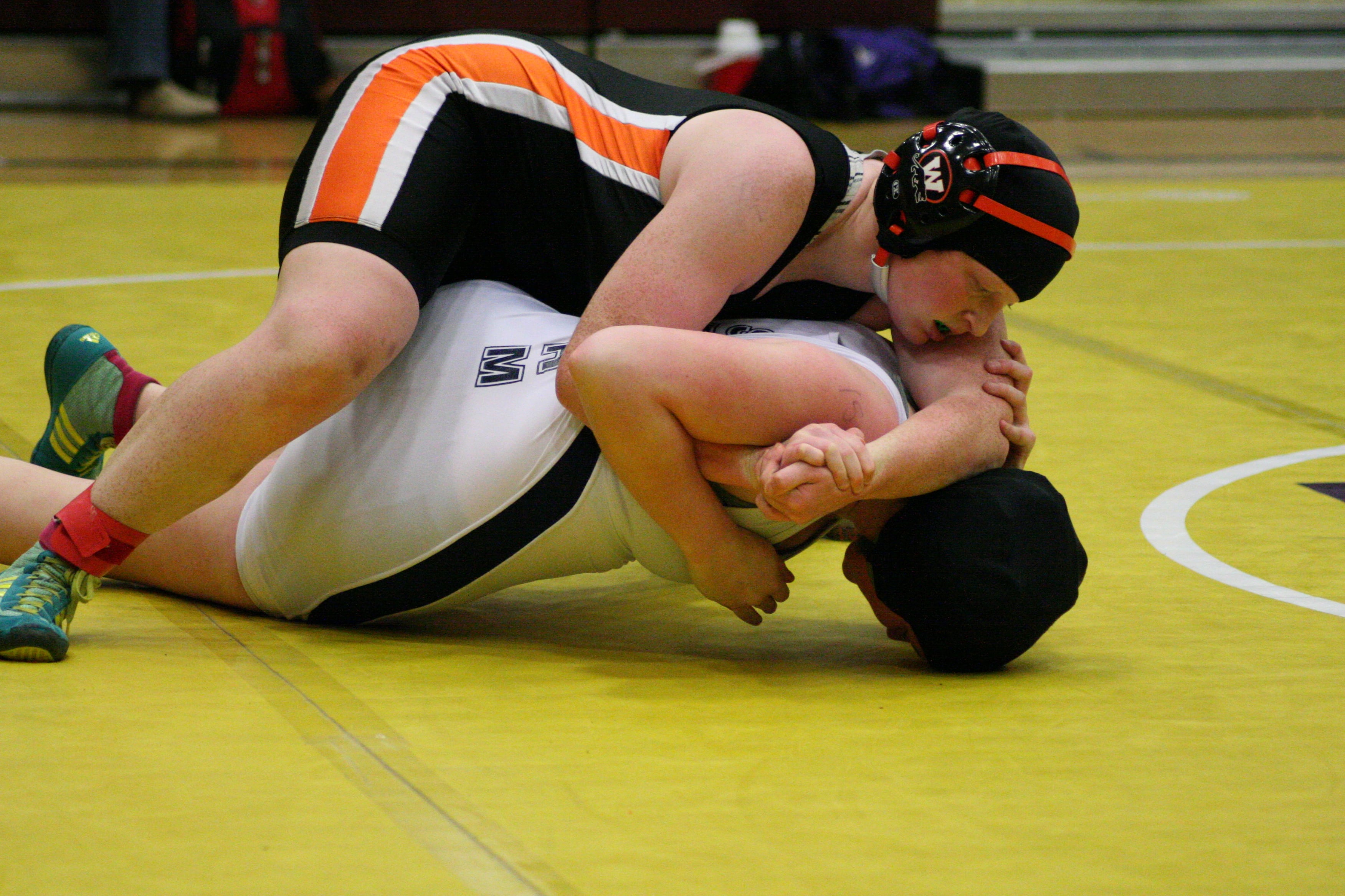Washougal sophomore Abby Lees grounds her opponent from Skyview in the 155-pound Clark County championship match.