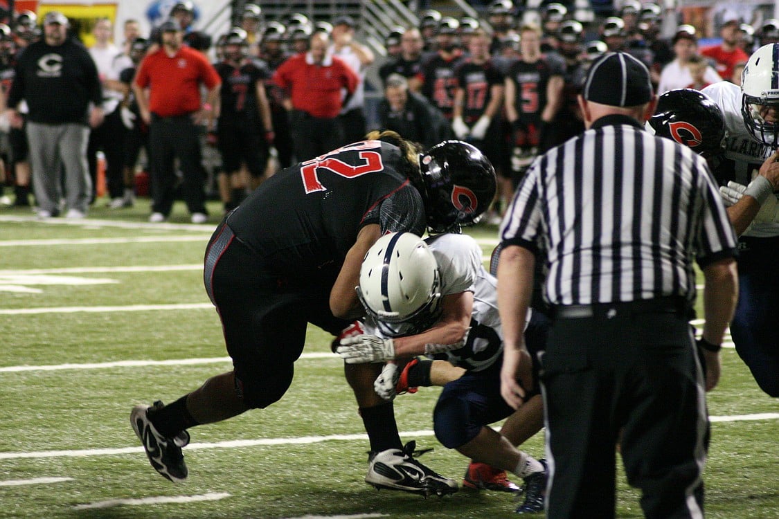 Camas battering ram Jason Vailea hits a Bellarmine Prep lineman like a ton of bricks.