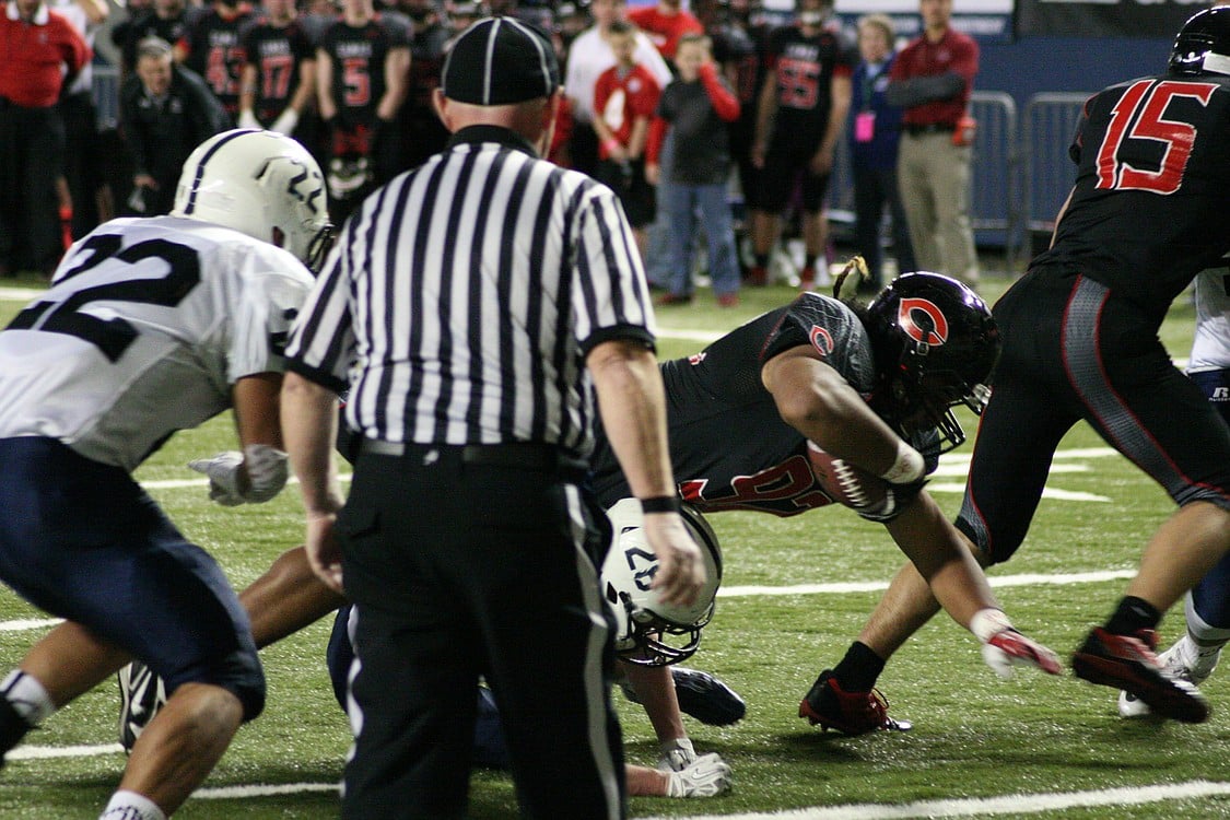 Jason Vailea dives into the end zone for a Camas touchdown.