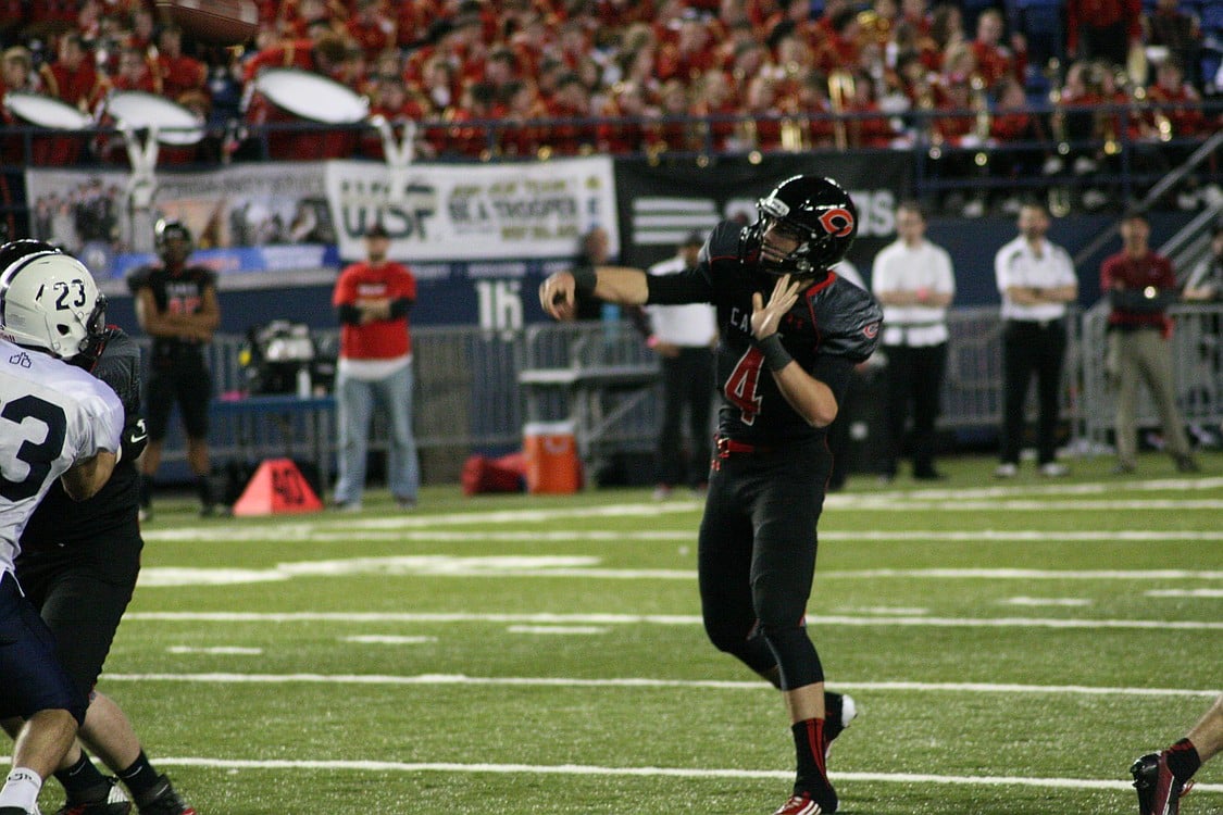 Camas quarterback Reilly Hennessey fires the football down the field.