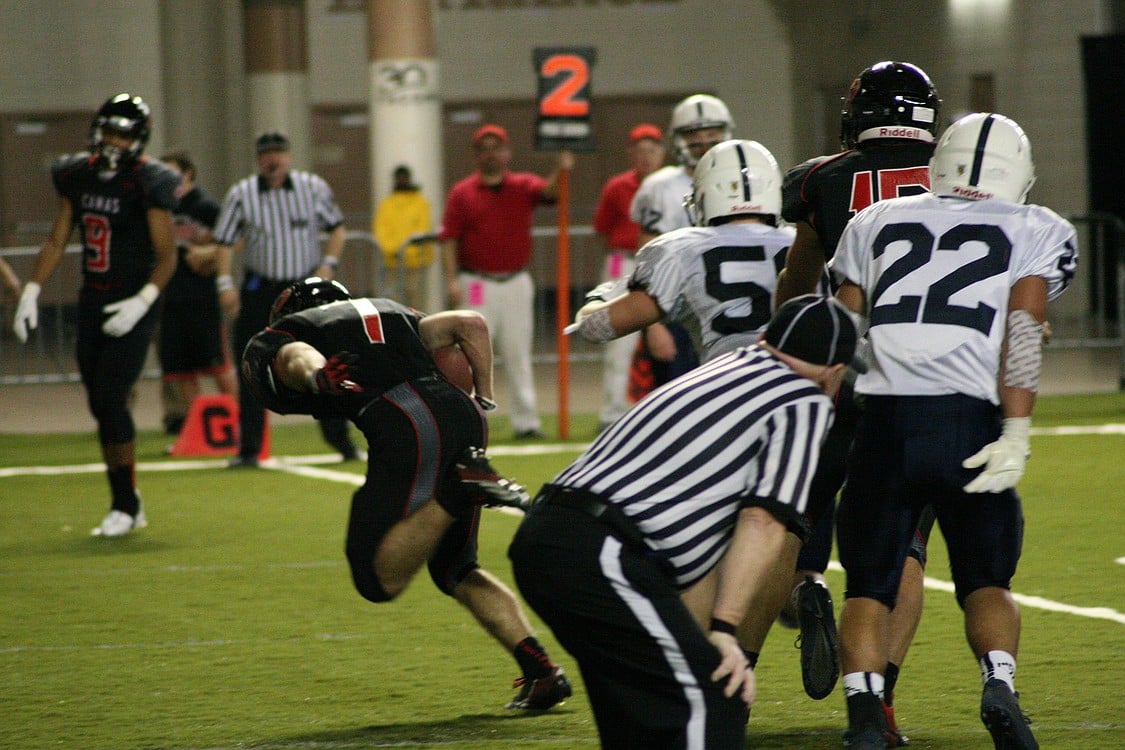Nate Beasley bowls into the end zone to score a touchdown for the Camas football team.