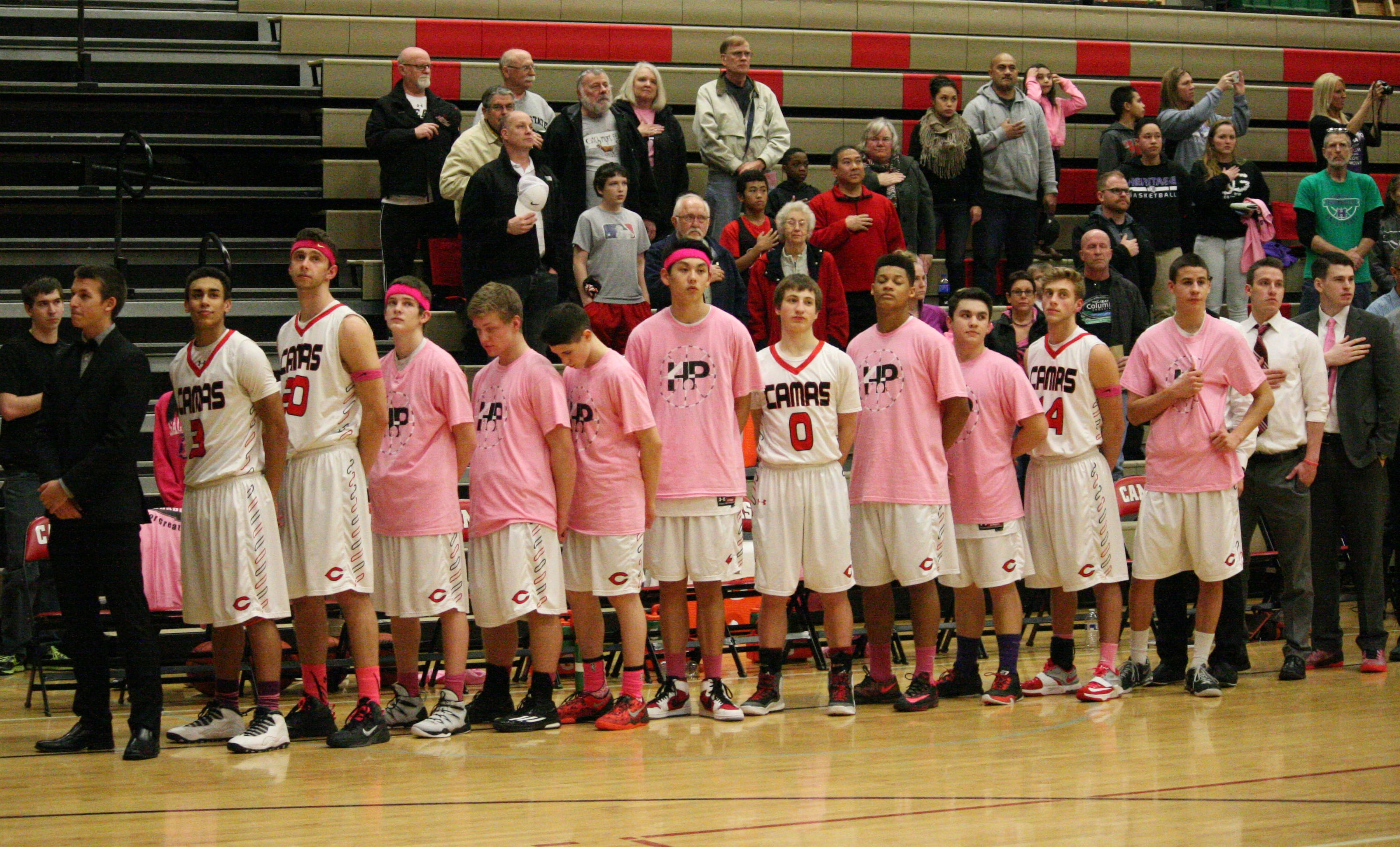 The Camas High School boys basketball team during National Anthem.