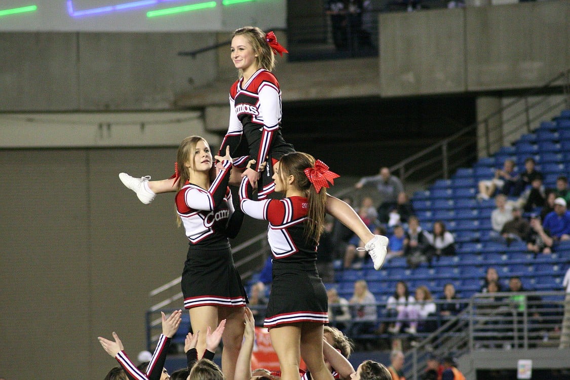 The Camas High School cheerleaders perform during halftime.