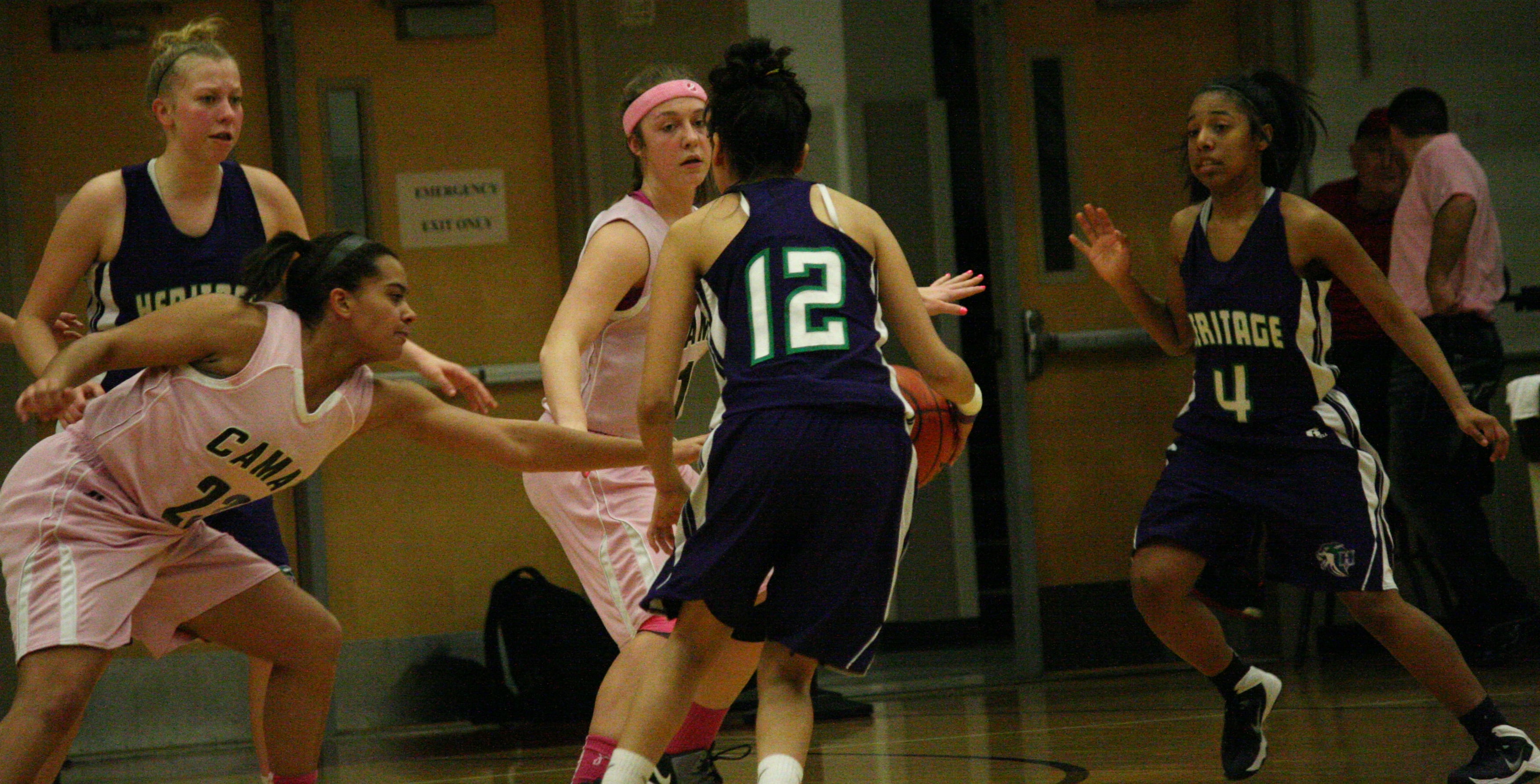 Rachel Gray and Teague Schroeder on the defense.