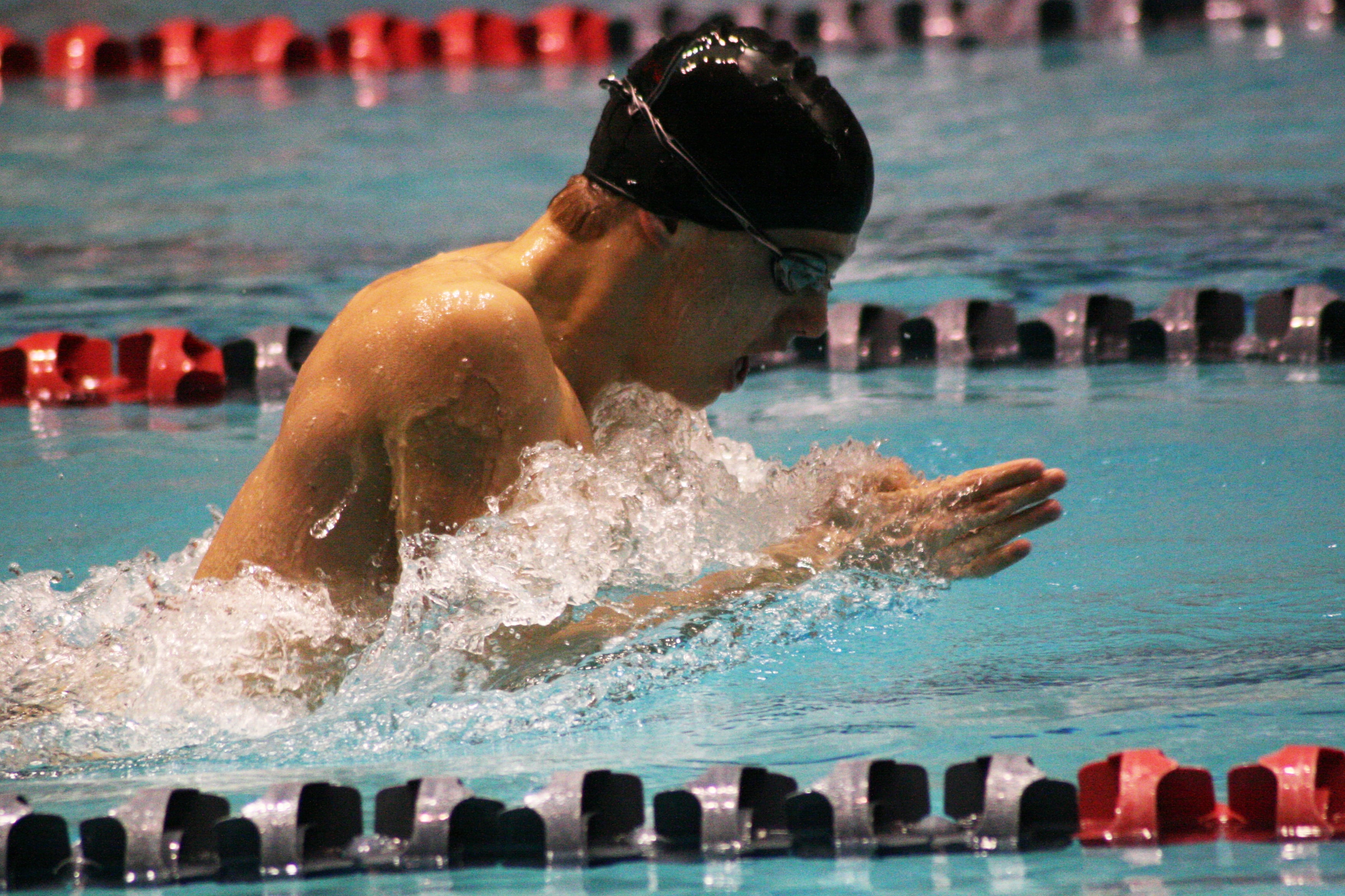 Kasey Calwell carves up the water during his 100 breaststroke preliminary heat.