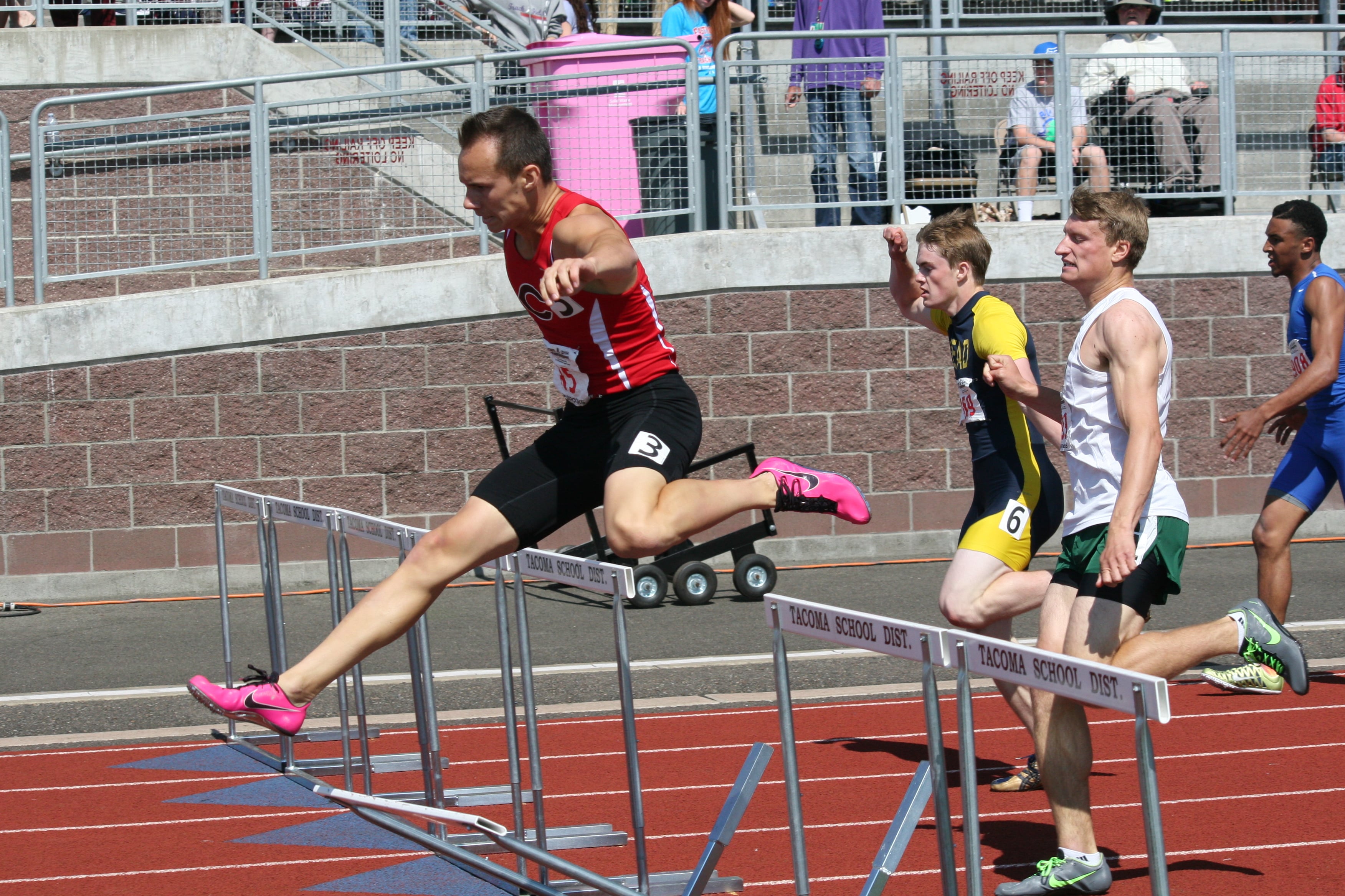 Ryan Gunther grabs second place in the 300 hurdles.
