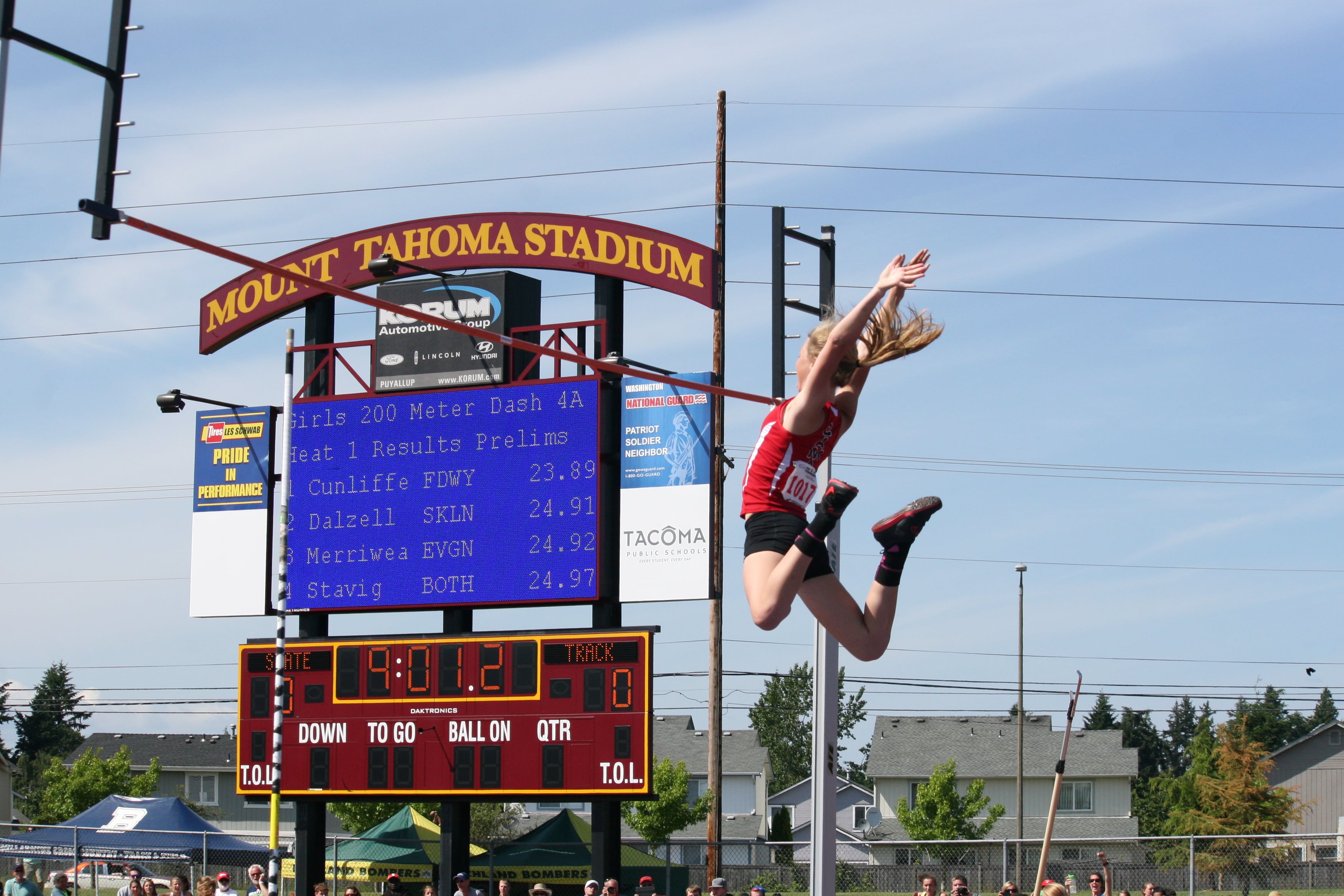 Caleigh Lofstead in free fall after clearing the bar set at 11 feet, 9 inches. She clinched third place in the pole vault at state.