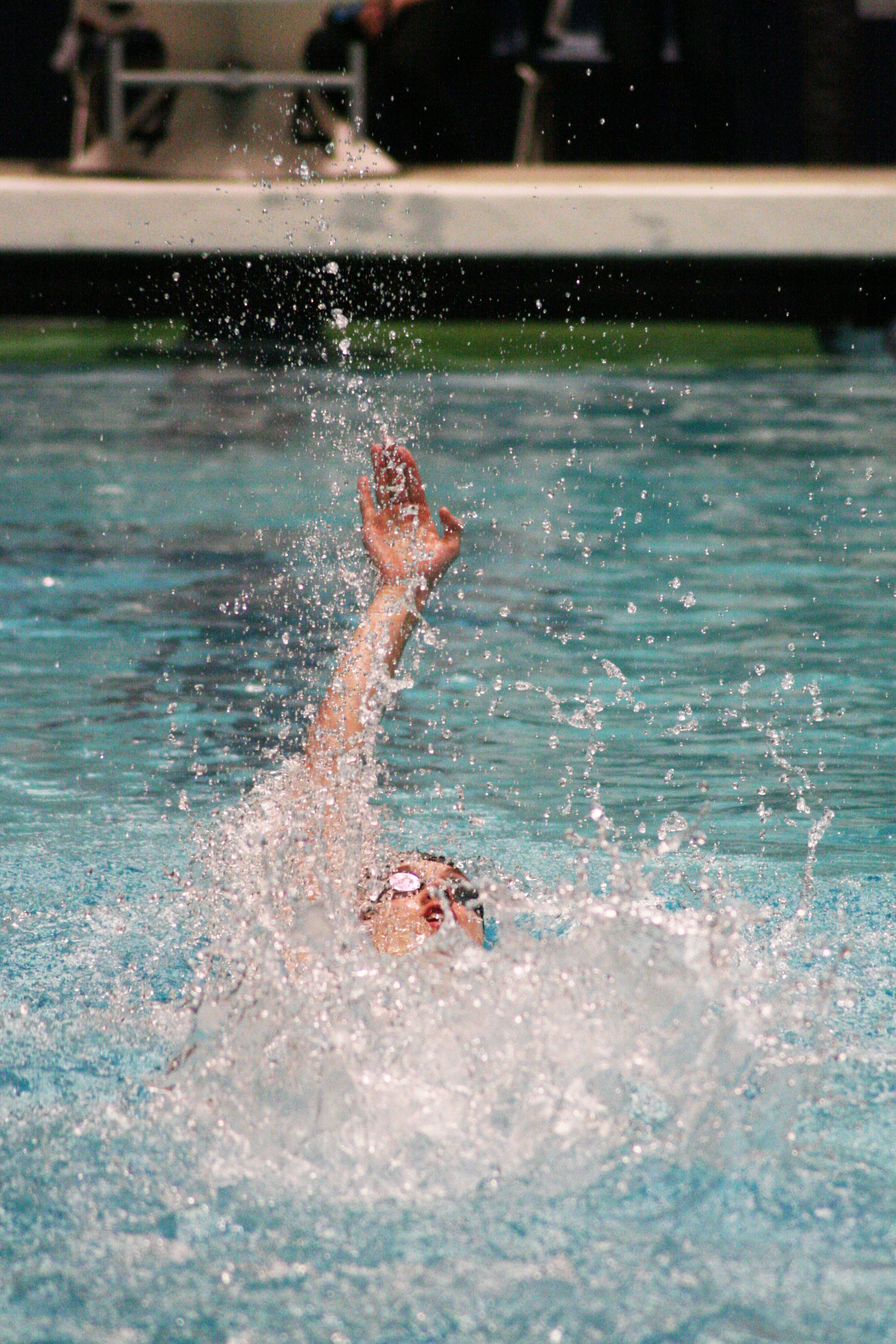 Kasey Calwell turns into the backstroke during the second lap of the 200 individual medley championship.