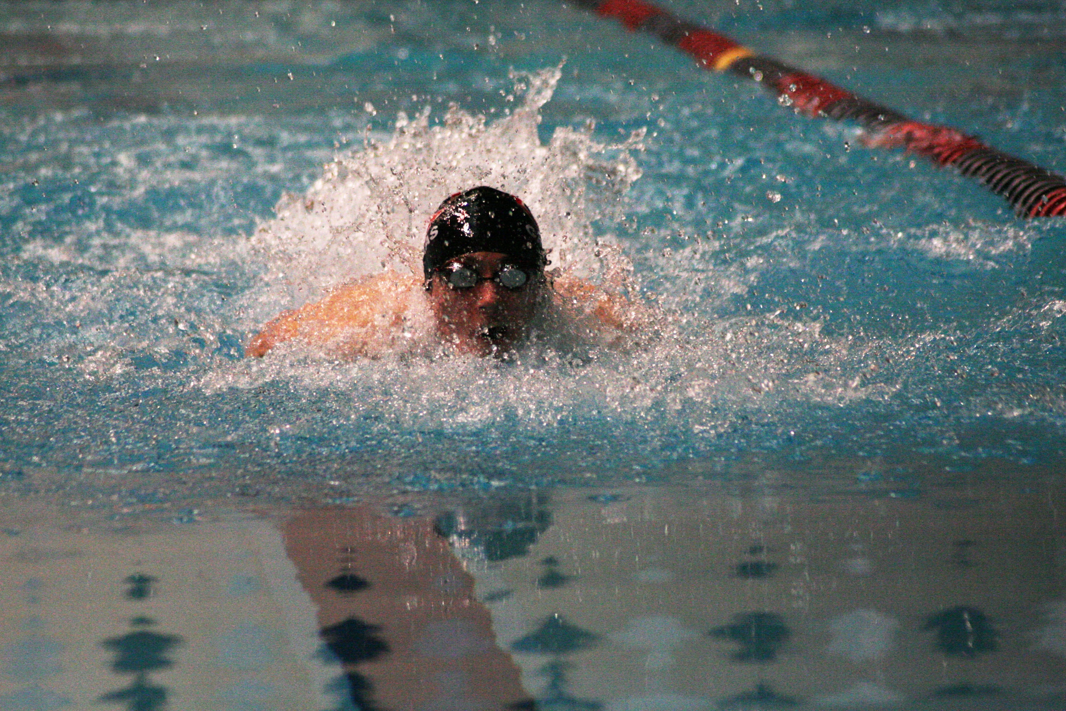 Lucas Ulmer on his way to a state championship in the 100 butterfly.