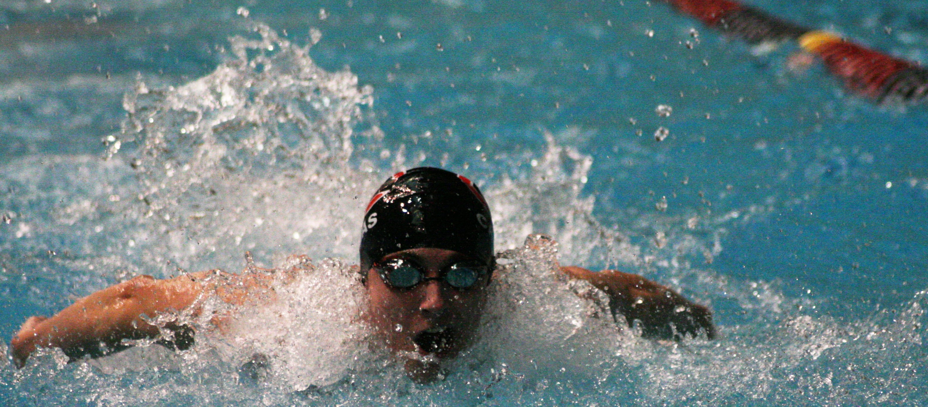 Lucas Ulmer captured the 100 butterfly state championship with a school record time of 51.1 seconds.