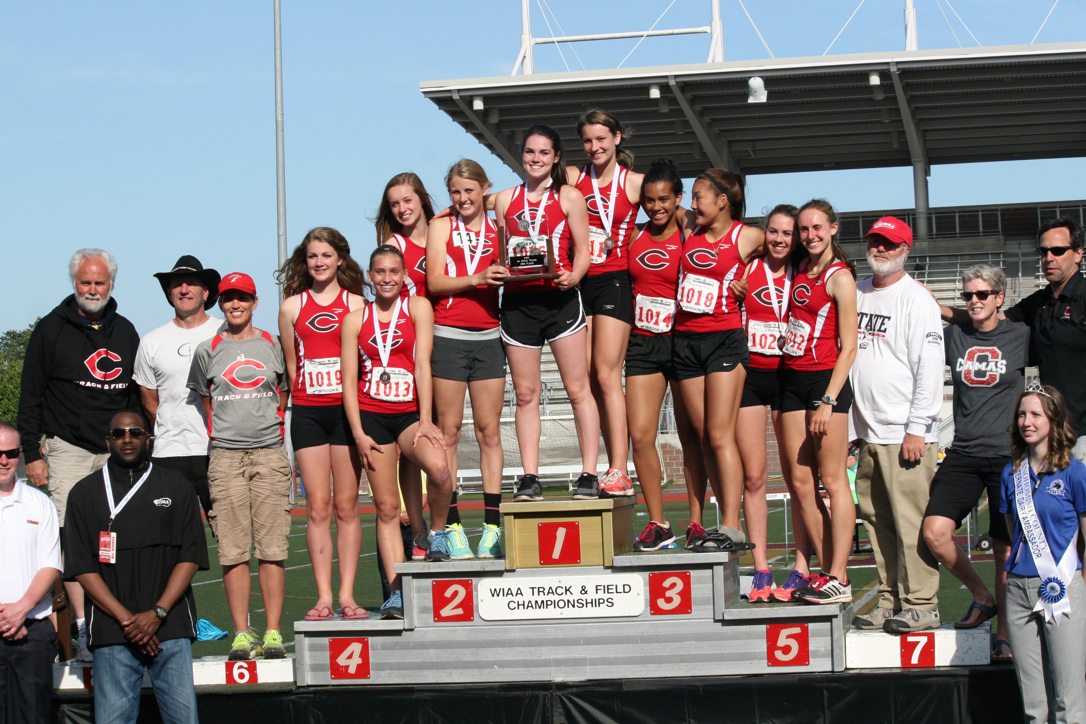 The Papermakers stand on the podium as the second place team in the 4A girls state track and field meet Saturday, at Mt. Tahoma High School in Tacoma.