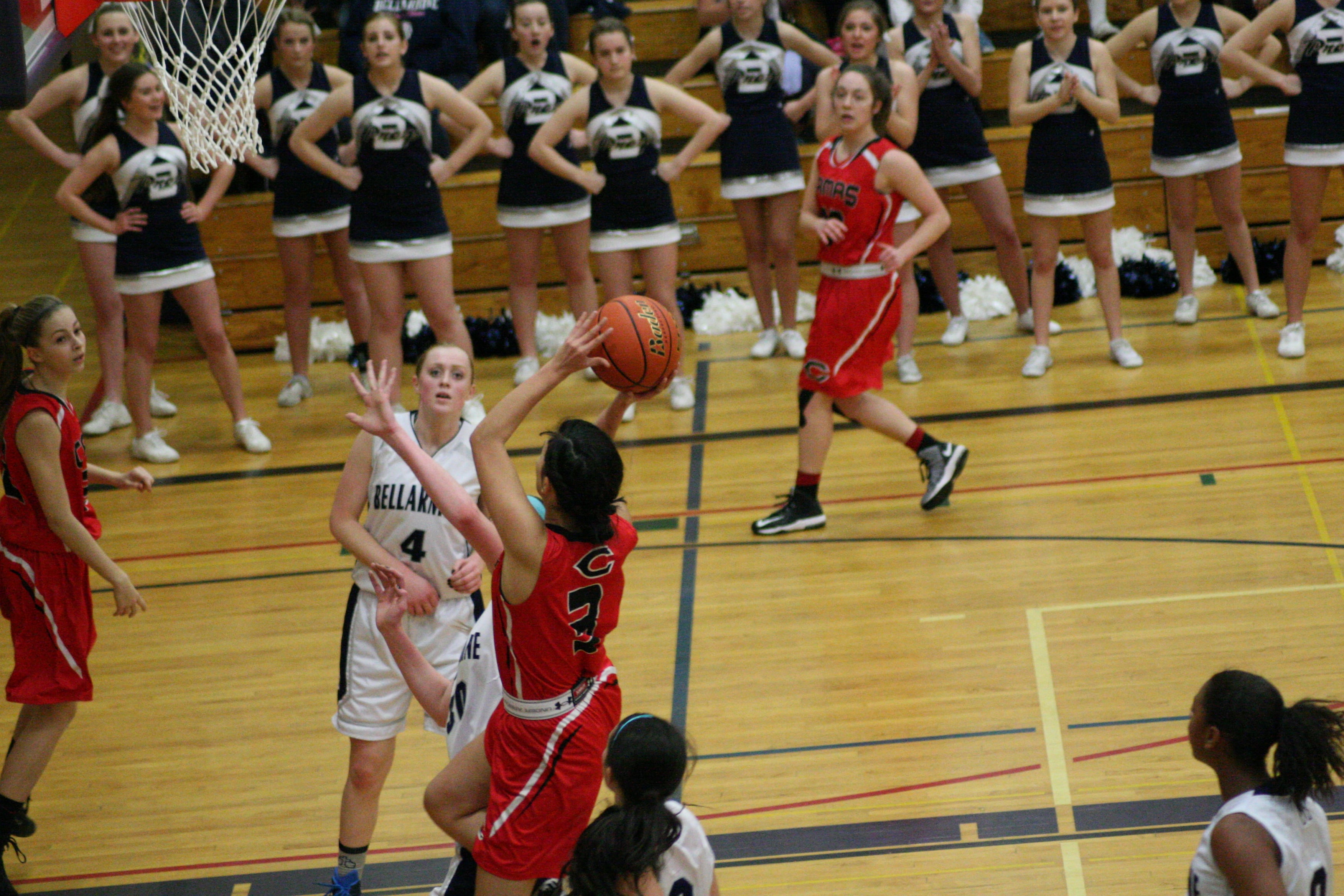 Brenna Khaw takes another crack at the basket.