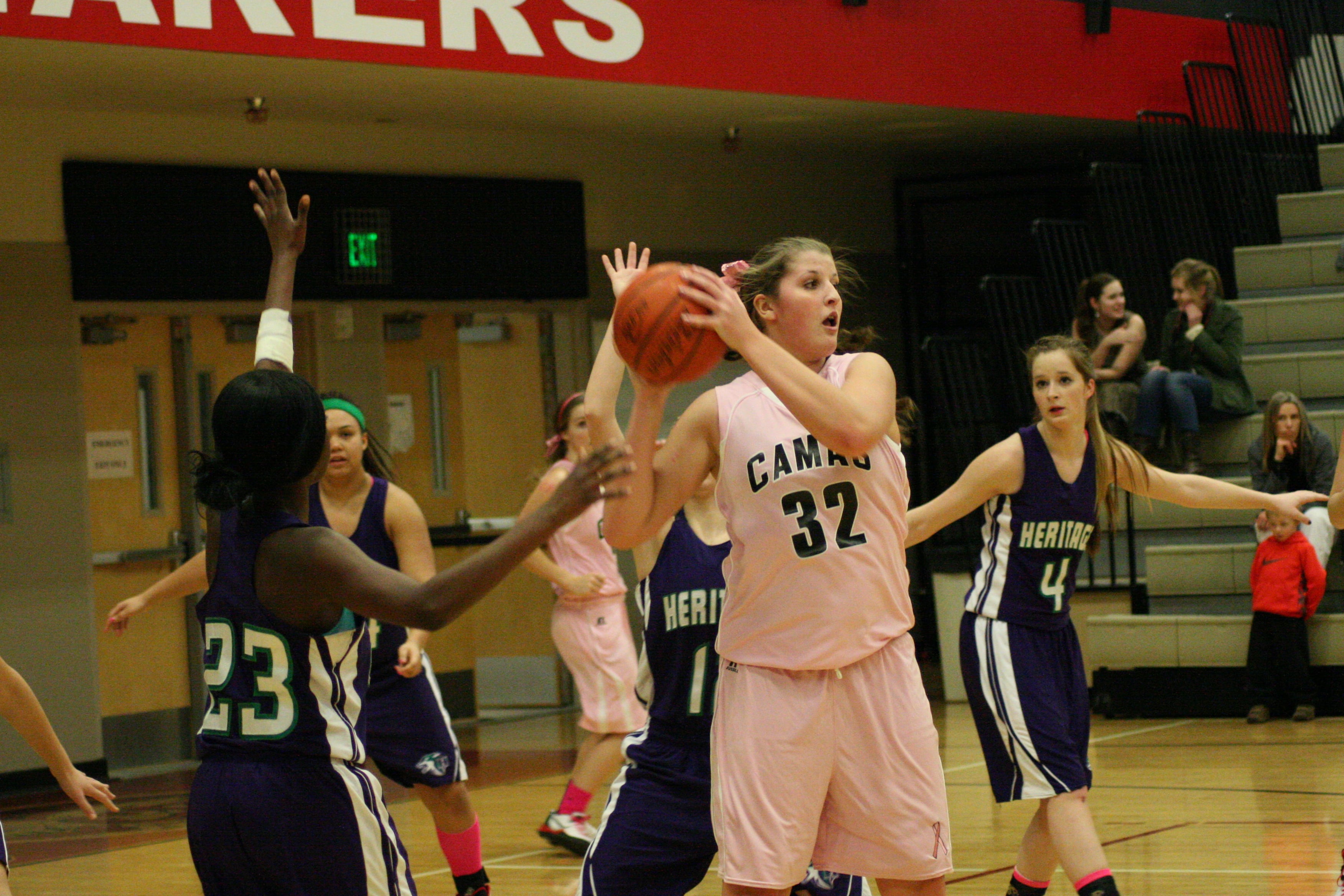 Nikki Corbett looks for a teammate to pass to after grabbing one of her 15 rebounds in the game.