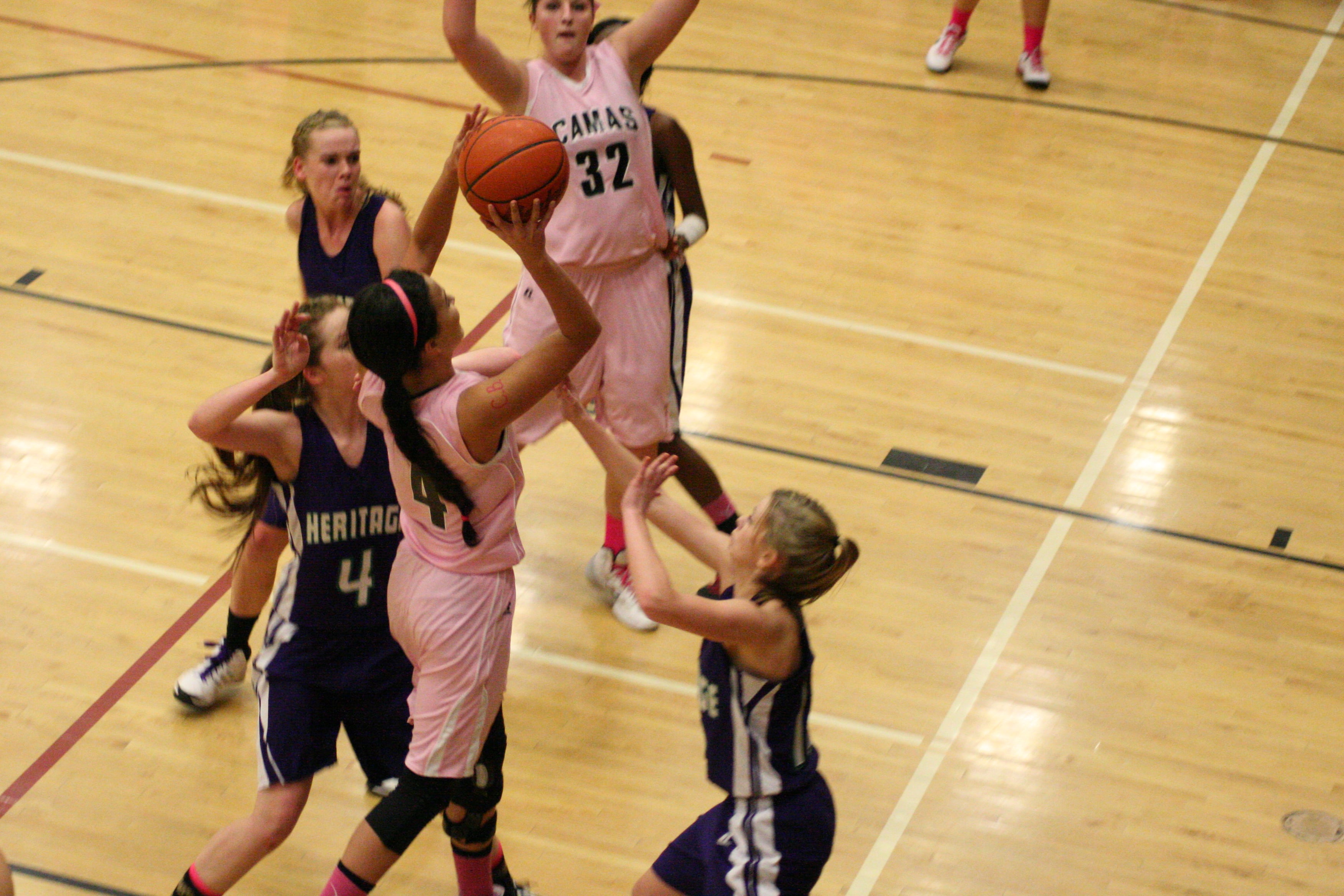 Brenna Khaw attacks the basket for the Papermakers.