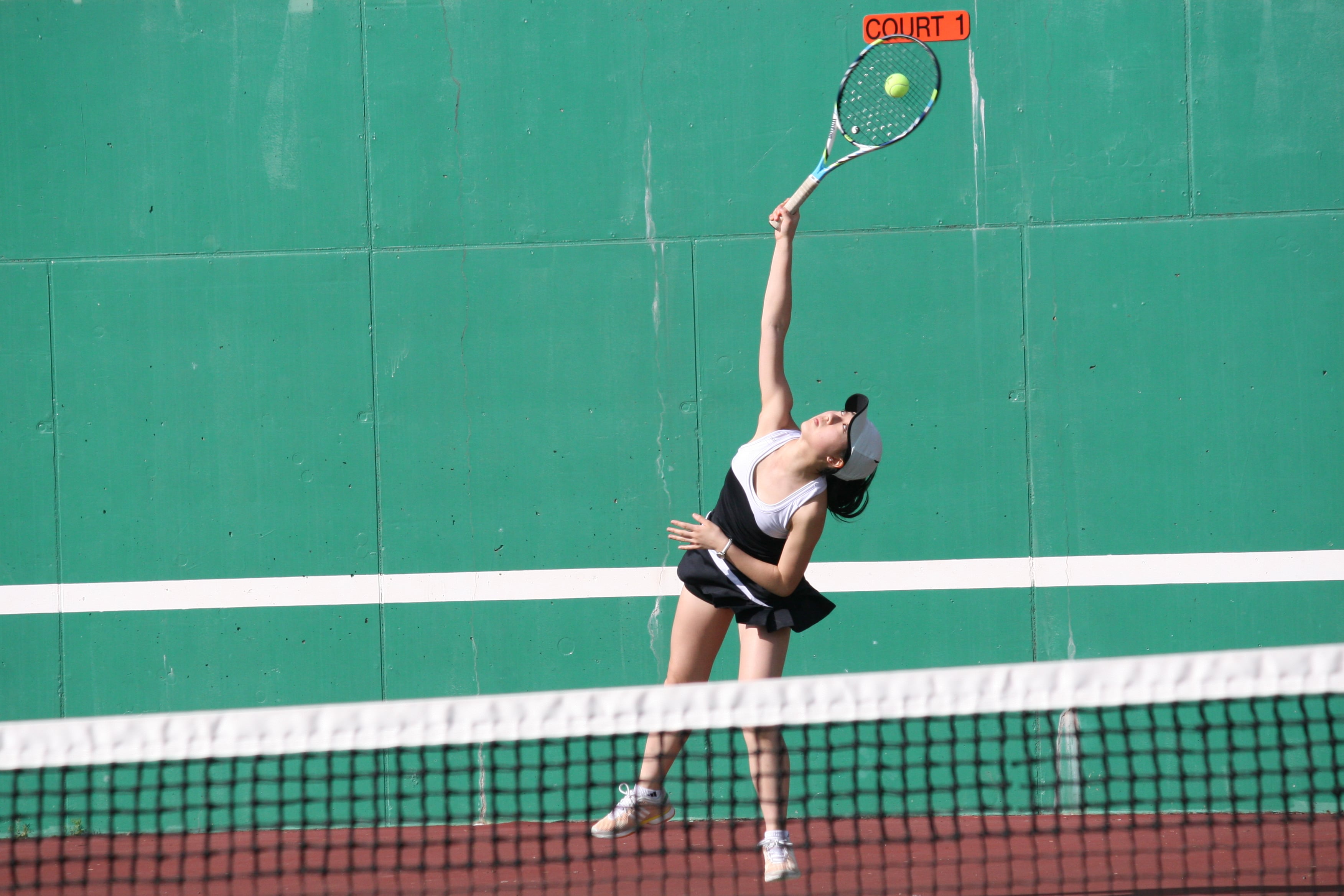 Esther Kwon serves for Camas.